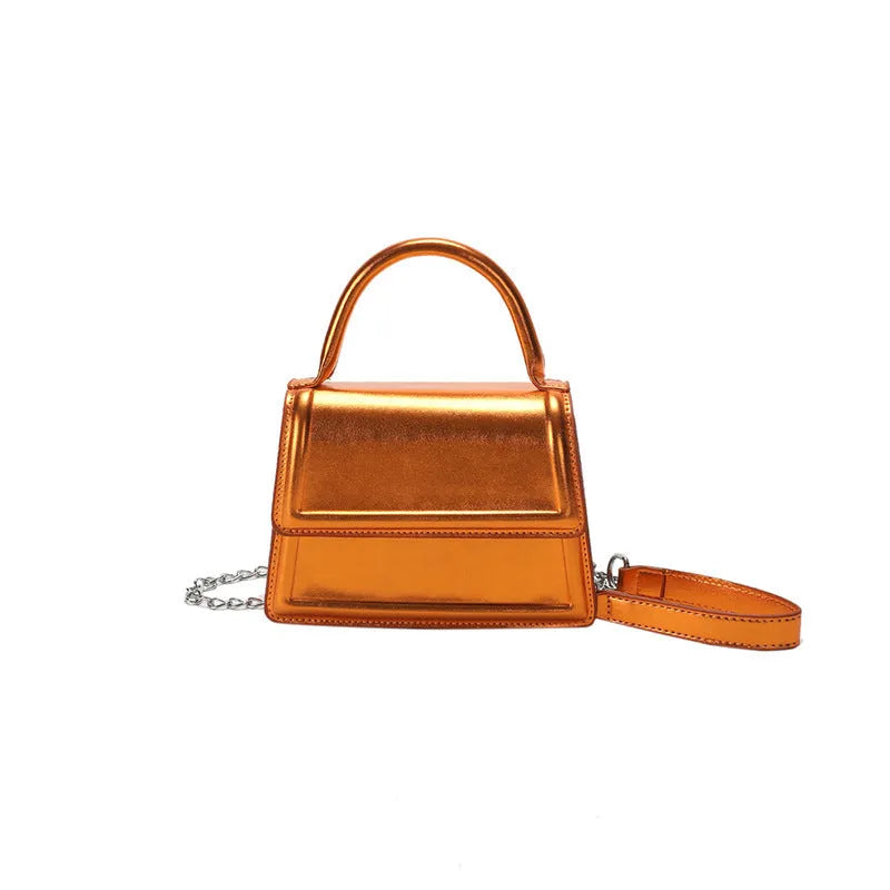Retro style square PU leather crossbody bag in multiple colours on a model.