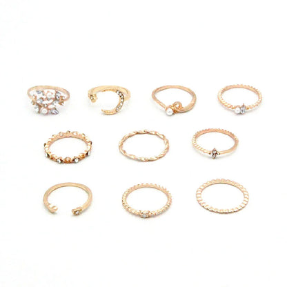 Enchanting gold-plated celestial-themed rings featuring stars, moons, and pearls