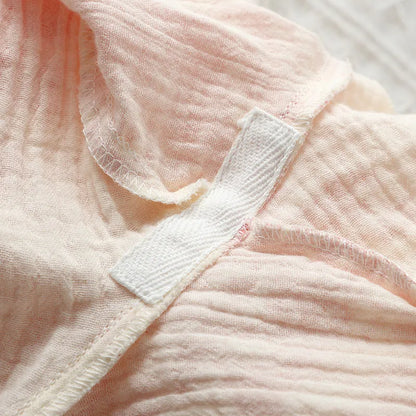 Women's pink pure cotton gauze long sleeve top and matching trousers lounge suit set.