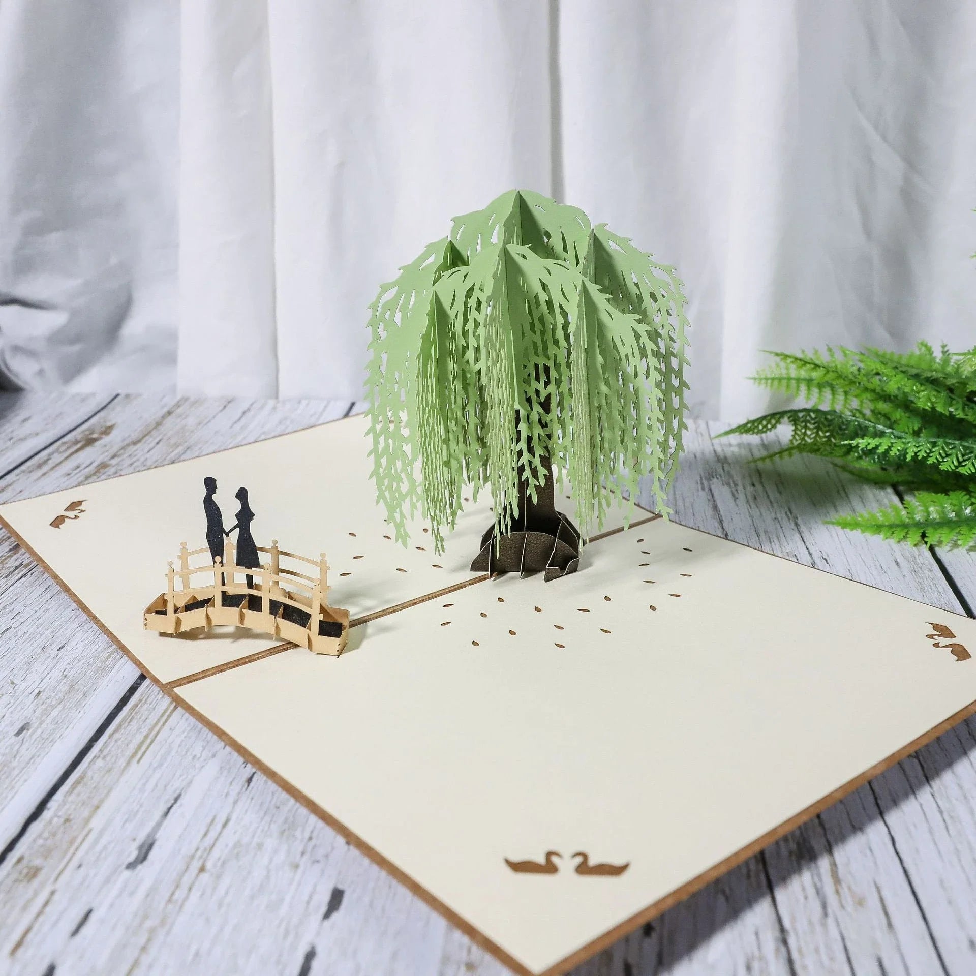 Enchanting 3D pop-up wedding invitation cards with laser-cut designs and floral motifs