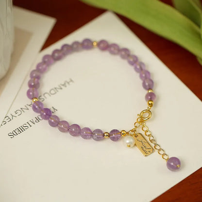 Women's natural crystal bracelet with lavender amethyst stones in dark and light colour options