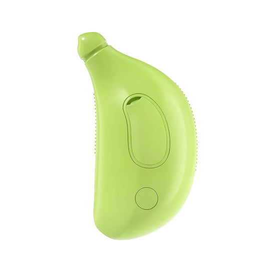 Green Cat Steam Brush with silicone paw-shaped teeth, shown grooming a cat's fur.