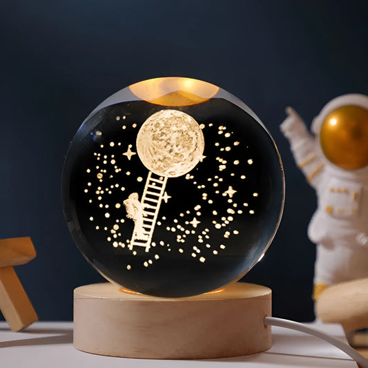 USB-powered luminous crystal ball decoration with starry sky design on a round wooden base.