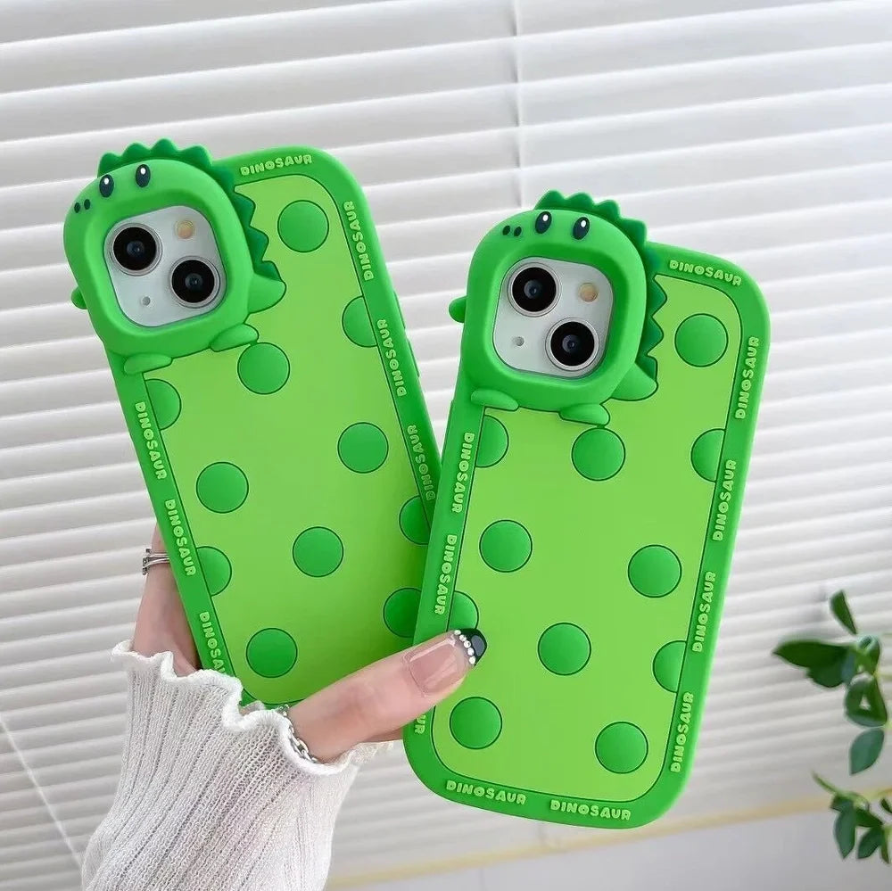 Green polka dot dinosaur silicone phone case showing back design and side protection for iPhone