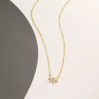 Minimalist lotus flower petal necklace in gold or silver, perfect for women and girls.