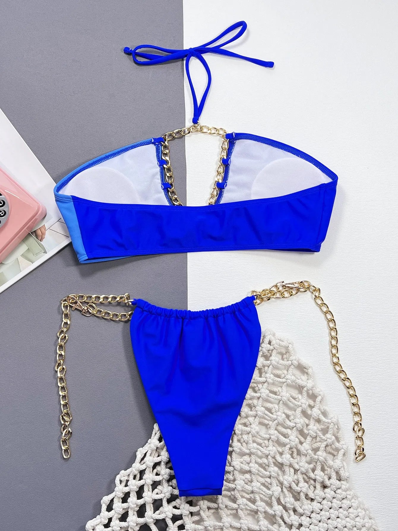 Blue solid colour women's two-piece nylon bikini swimsuit set.