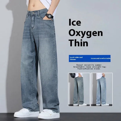 Straight-leg casual trousers in thin denim fabric with zip fly placket, available in UK2560 blue, grey, light blue, and vintage blue colours