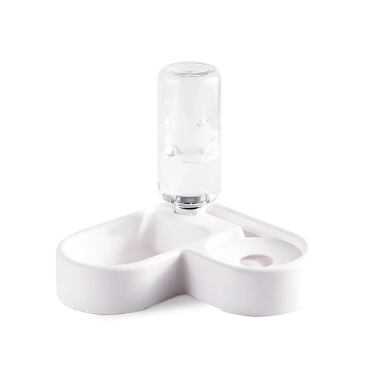 White plastic pet water fountain with pump for cats and dogs on a floor.