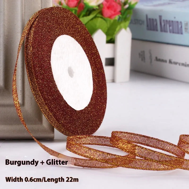 Polyester gift packaging bow ribbon showing 0.6cm width and colour options including gold leaf and metallic variations
