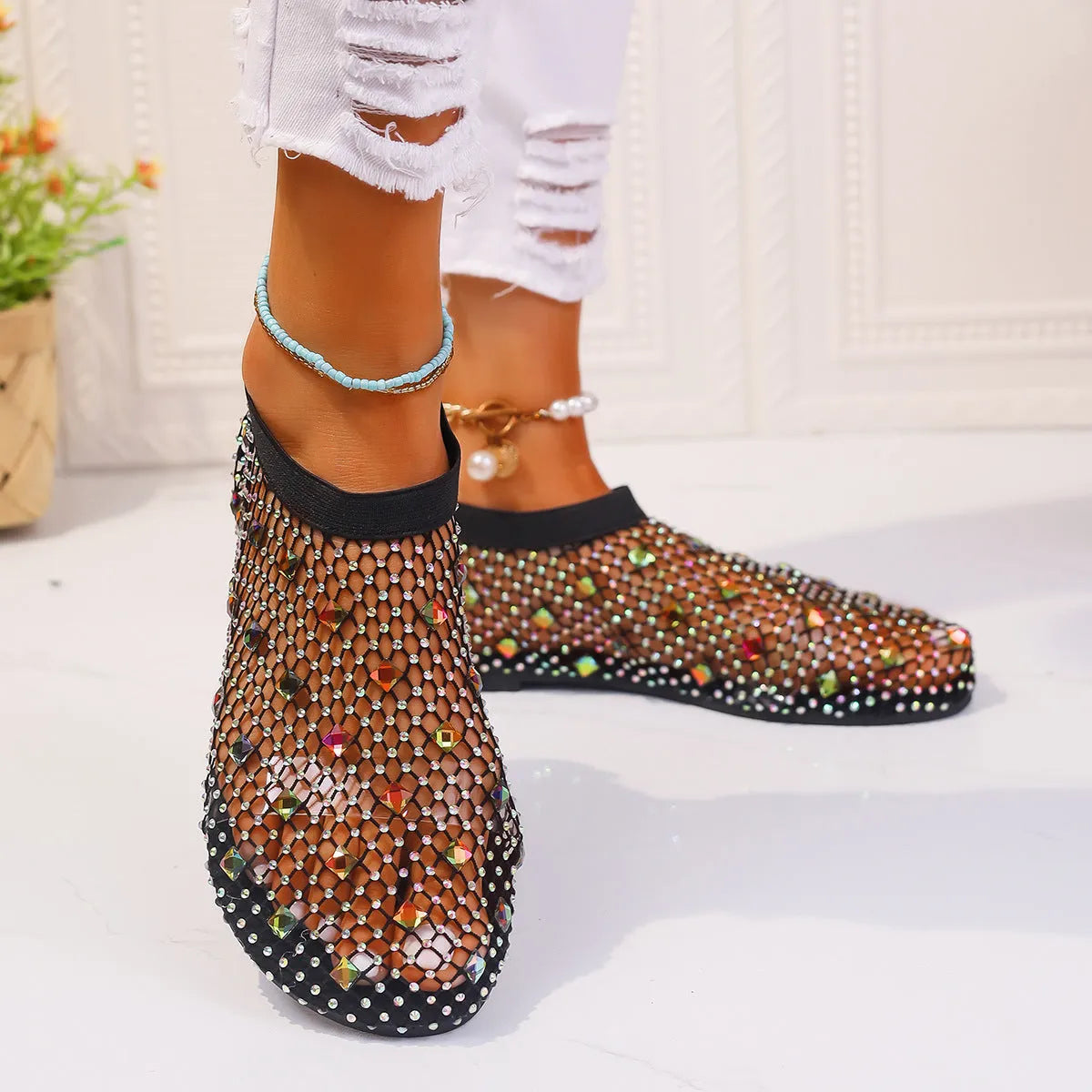 Women's flat sandals with mesh upper, colourful rhinestones, and rubber sole in sizes 35-43