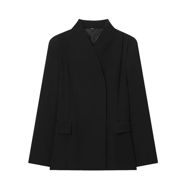 Women's black slim-fit suit jacket with regular sleeves on hanger