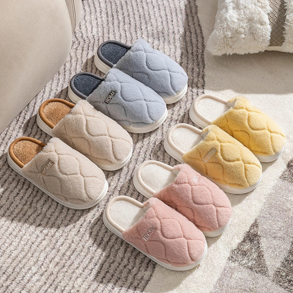 Cozy plush slippers in various colors, including light gray, khaki, yellow, and pink, with a soft plush upper and durable PVC sole for indoor and outdoor use.