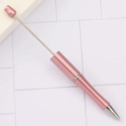 Rotating bead ballpoint pen in gradient colour with ABS plastic and steel wire construction
