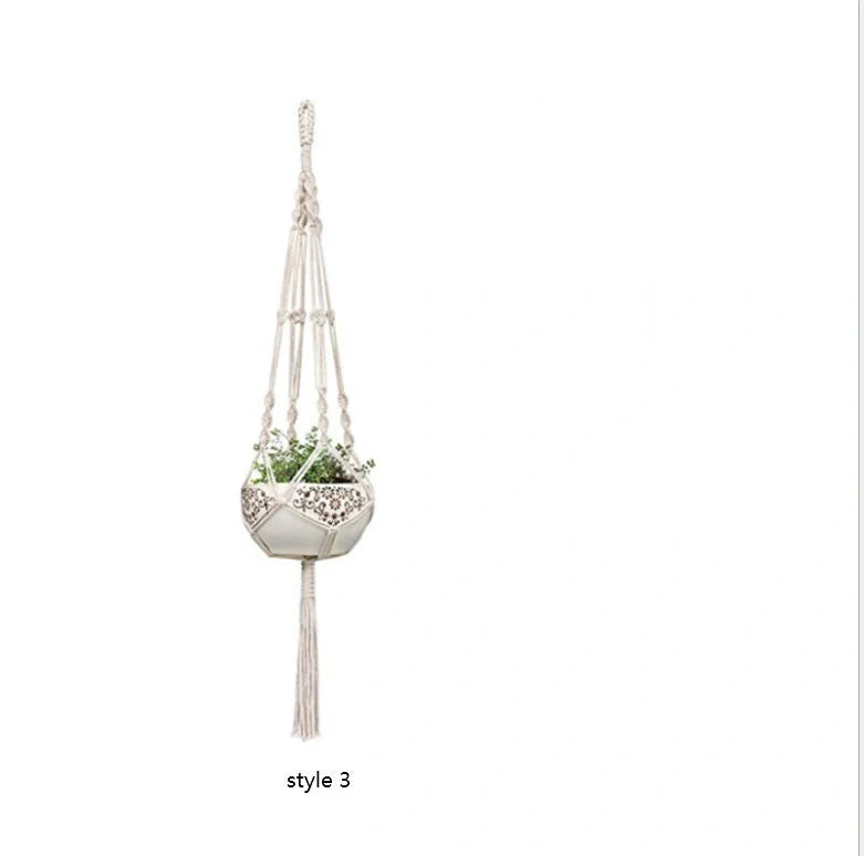 Set of four hand-made macrame hanging baskets for plants, made from 100% cotton rope.