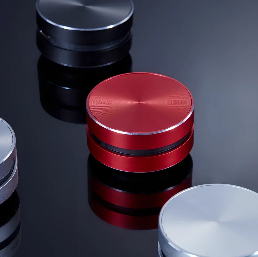 Bone conduction wireless Bluetooth speaker with magnetic base measuring 26mm height and 40mm diameter