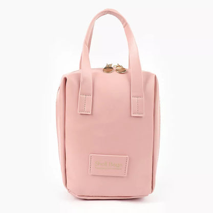 Girly Heart Egg Shell Waterproof Makeup Bag in pink and white with sewing line design