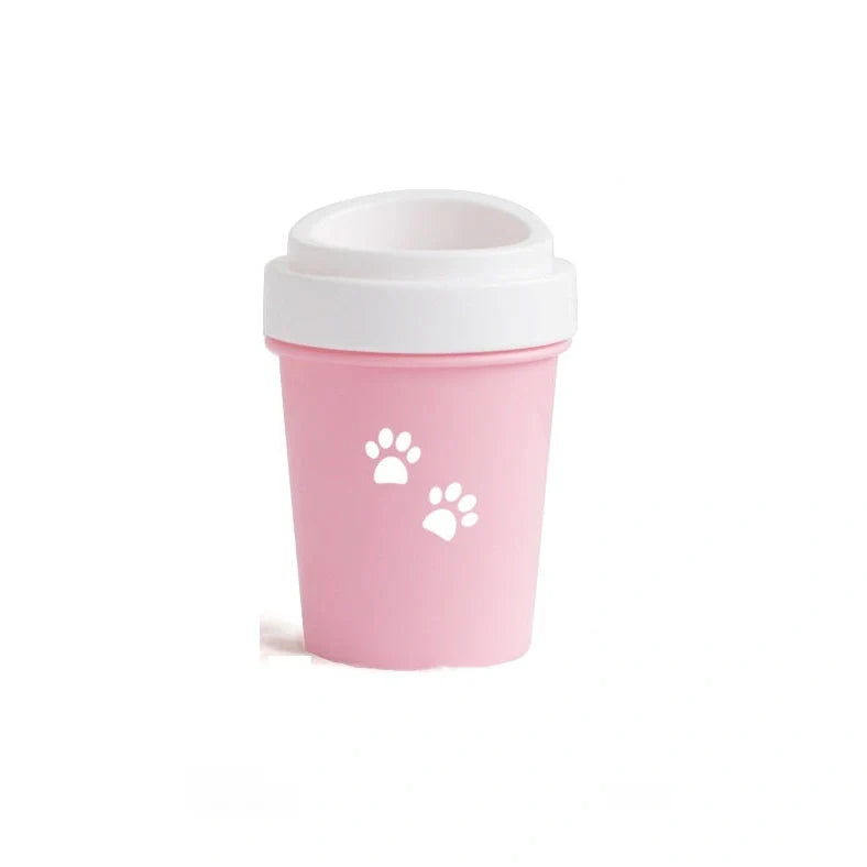 Silicone dog paw cleaner cup in blue, green, or pink with soft bristles for washing muddy paws