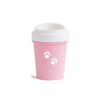 Silicone dog paw cleaner cup in blue, green, or pink with soft bristles for washing muddy paws