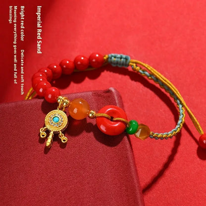 Hand-woven cinnabar peace blessing bracelet in emperor red sand with national style geometry design
