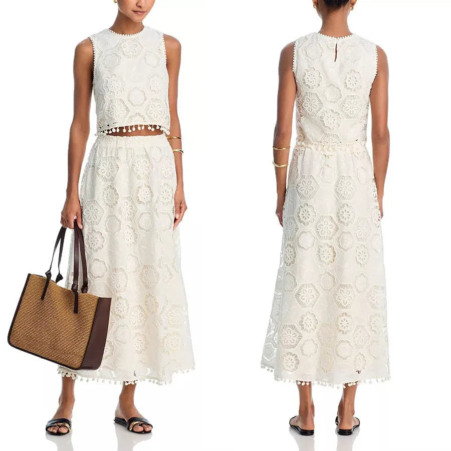 White women's sleeveless top and embroidered long skirt suit with retro art styling