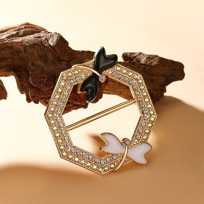 Bow-shaped waist-cinching accessory clip for high-end brooches, alloy with electroplating and diamond inlay, shown in gold, silver, or rose gold finishes.
