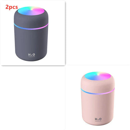 Compact and Quiet Bedroom Mist Humidifier with Soothing Mood Lighting in White, Navy Blue, and Pink Colors
