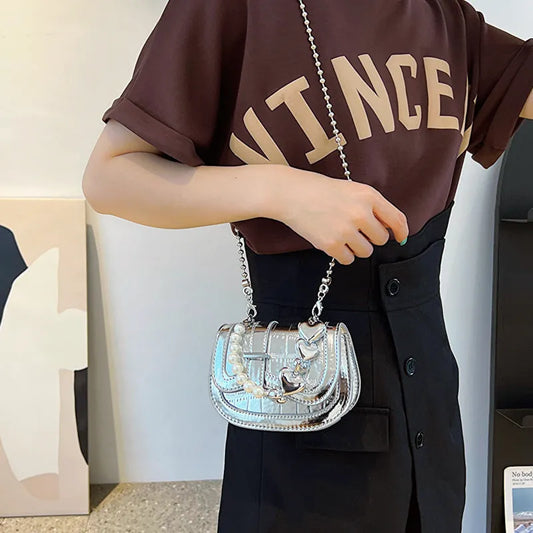 Laser Pearl Tote Saddle Girl Mini crossbody bag in black with sandwich pocket design and adjustable strap