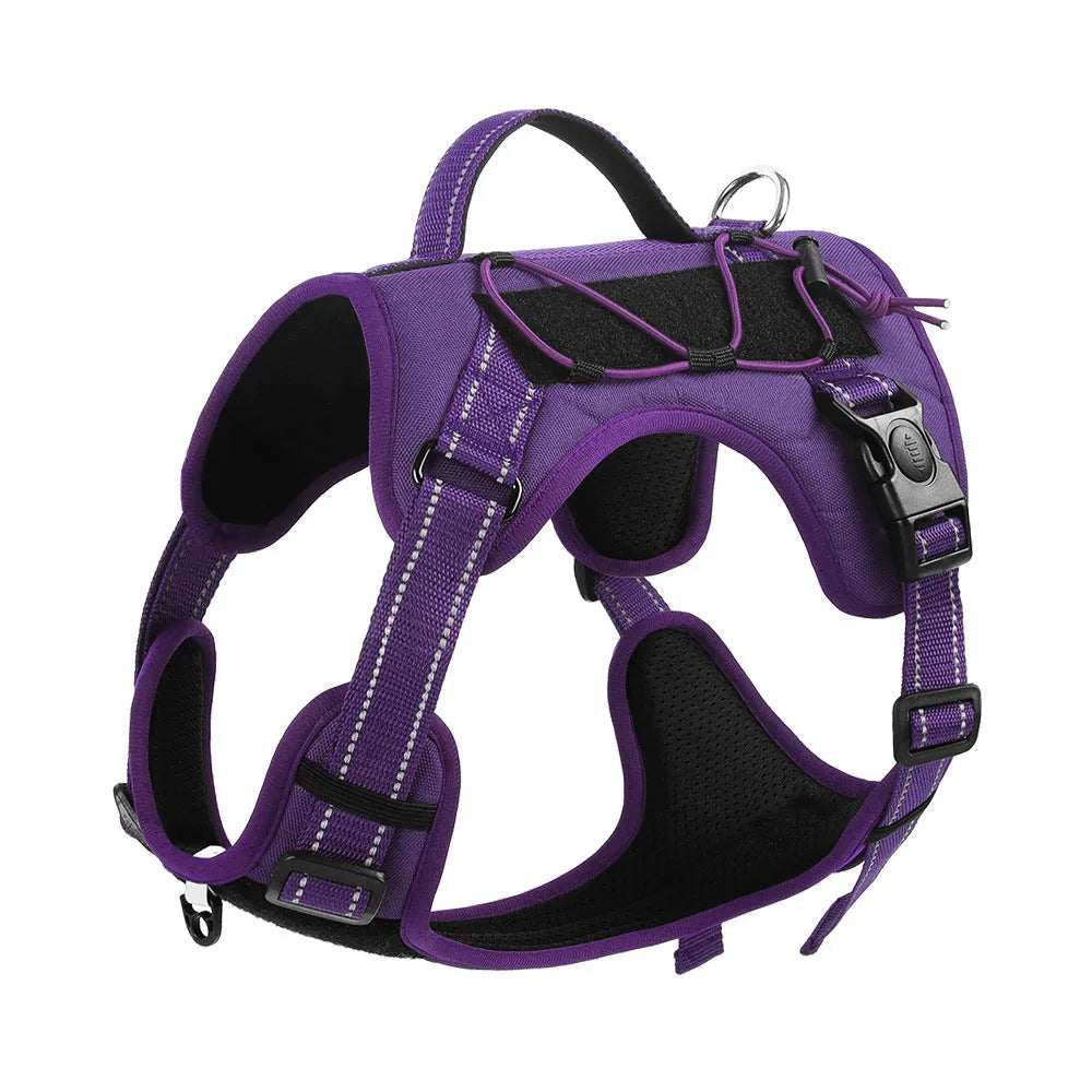 Orange reflective dog harness with attached black hand-holding rope leash shown on a medium-sized dog.