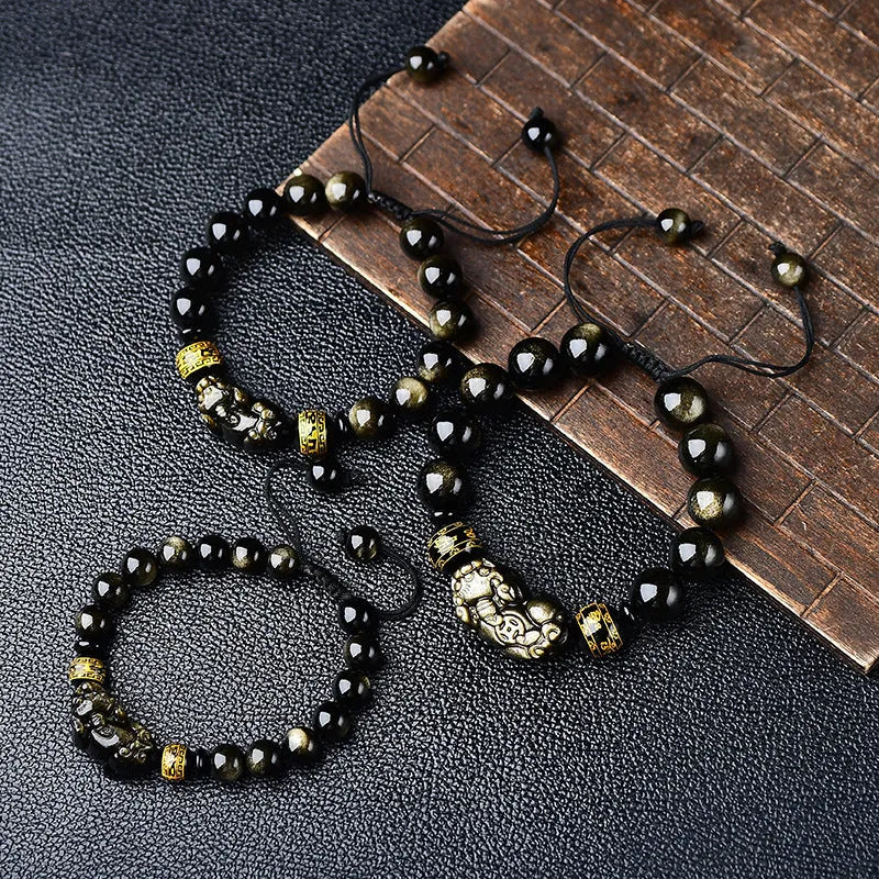Hand-woven golden obsidian Pi Xiu bracelet with animal design, showing bead size options.