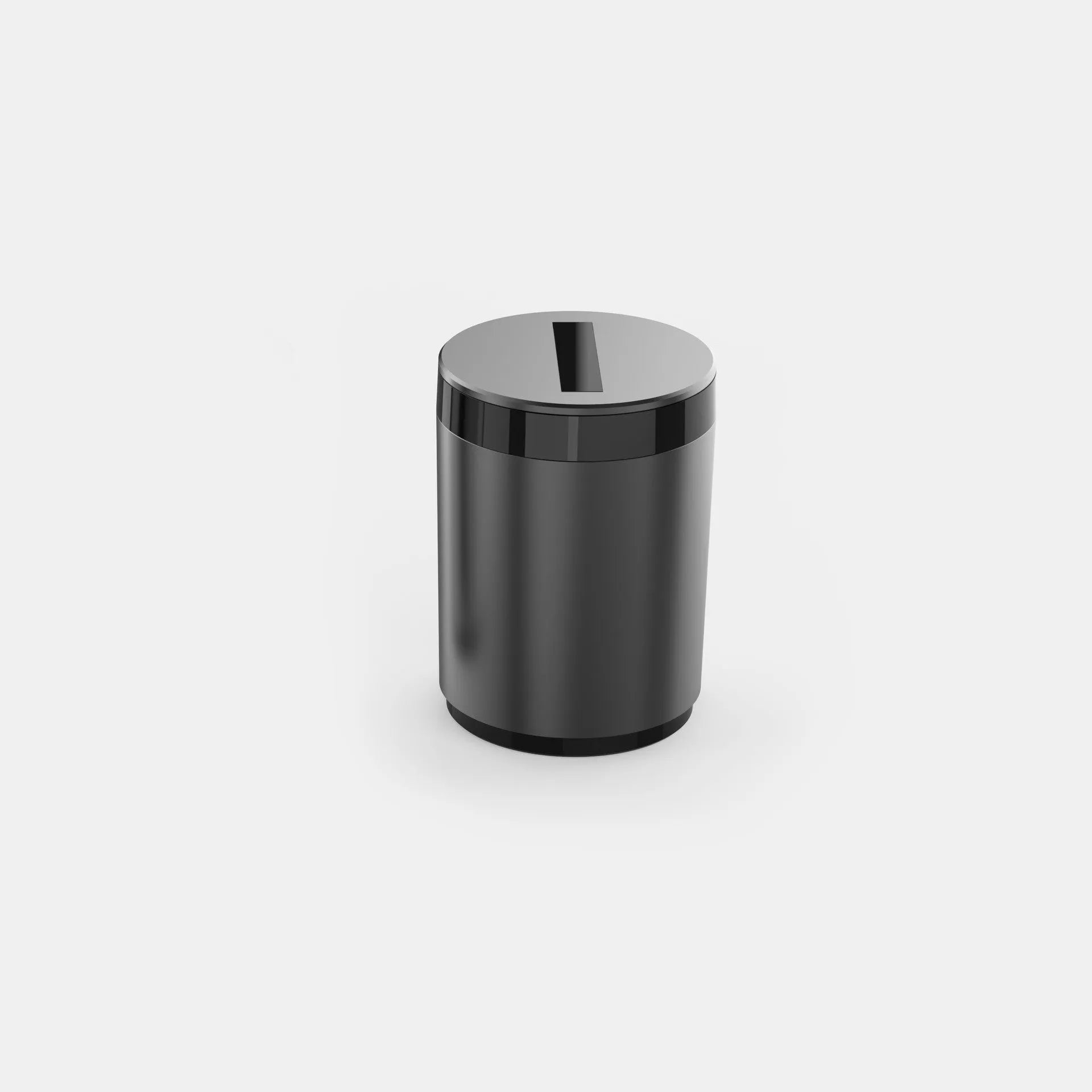 Automatic car ashtray in secret silver colour on a desktop, showing compact 7x10cm size.