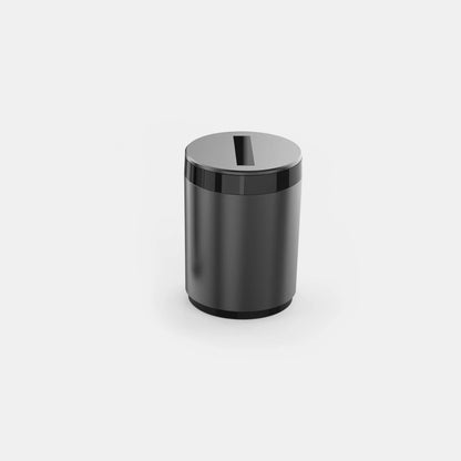 Automatic car ashtray in secret silver colour on a desktop, showing compact 7x10cm size.