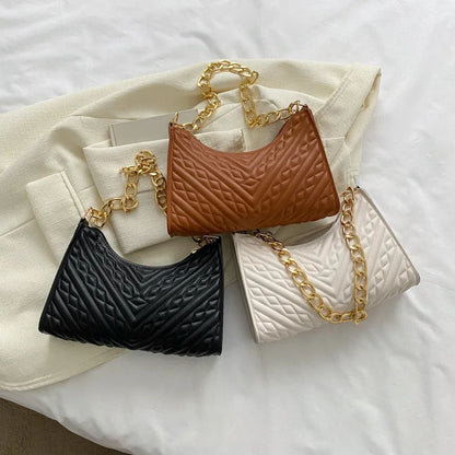 Brown pleated chain baguette shoulder underarm bag with adjustable strap and soft carry handle