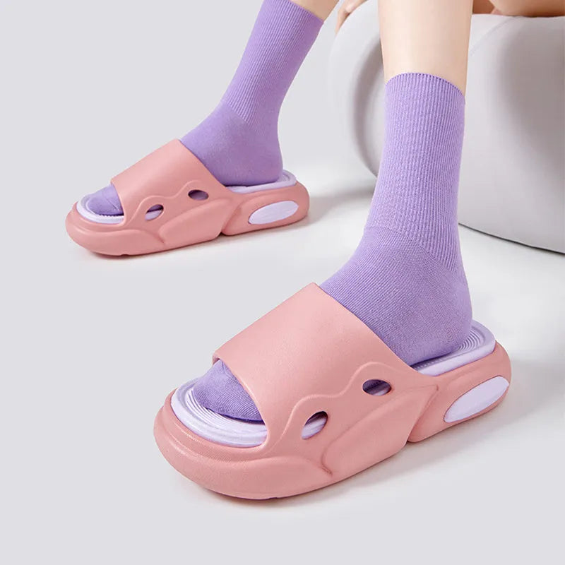 Two-colour thick-soled EVA slippers with a leather lining, shown in pink and purple.