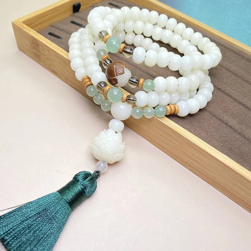 White Jade Bodhi bracelet with 108 beads showing three different bead size options