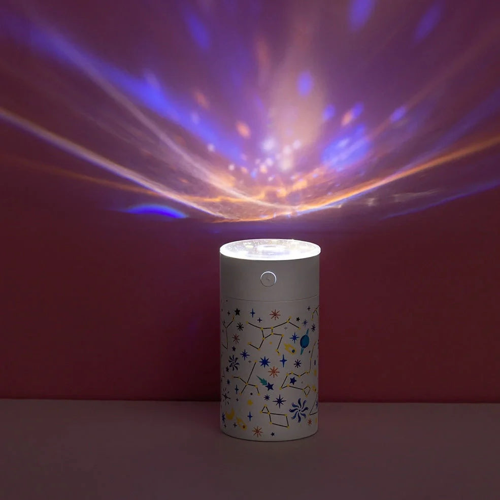 Round plastic star projector humidifier with water tank and USB cable, 67x67x125mm dimensions