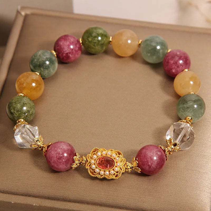 Jade colour tourmaline round bead bracelet for women with alloy inlay and rhinestones on a pearl crystal base.
