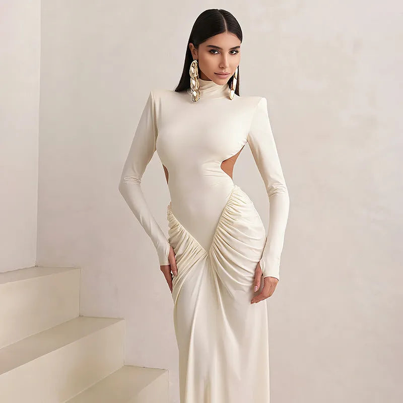 Women's long sleeve high collar slim fit dress with pleated backless design in light apricot colour
