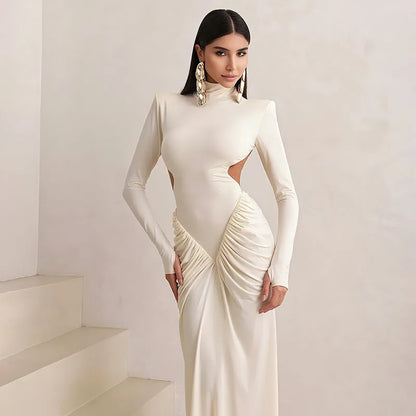 Women's long sleeve high collar slim fit dress with pleated backless design in light apricot colour