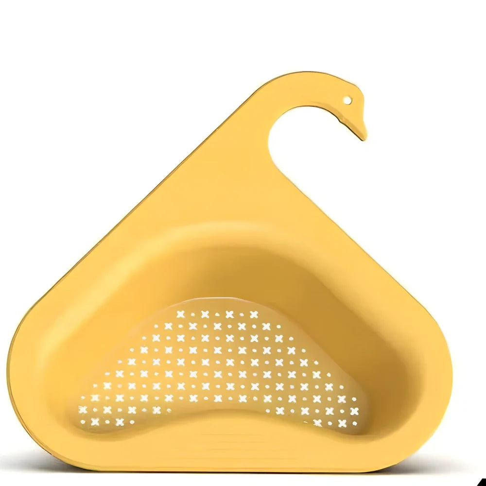 Yellow swan-shaped plastic kitchen drainer basket with drainage holes on kitchen counter