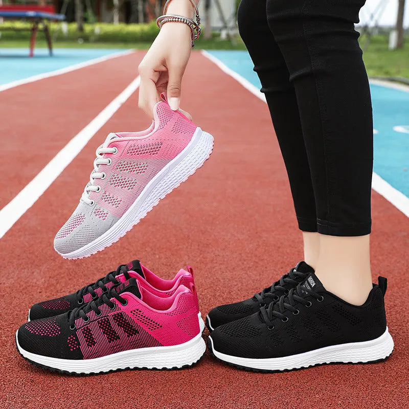 Women's Fly-knit running sneakers in black, rose red, or gray pink with soft bottom and flat heel.