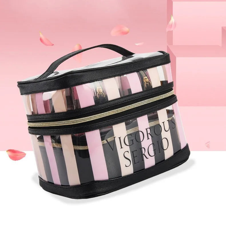 Pink and white floral pattern makeup bag with bold stripes, made from synthetic leather.