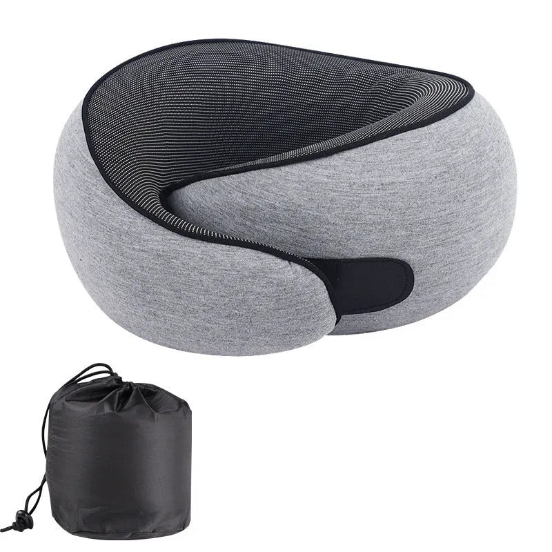 U-shaped grey memory foam travel neck pillow with storage bag.