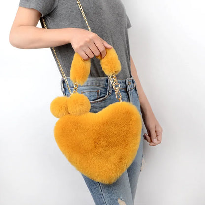 Women's soft plush heart-shaped handbag with shoulder strap in multiple solid colours