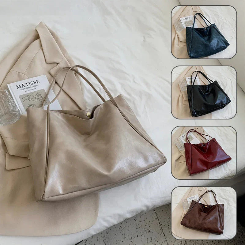 Stylish leather shoulder bag in various colors, including wine red, blue, black, brown, and beige. Showcases a versatile and spacious design for everyday use.