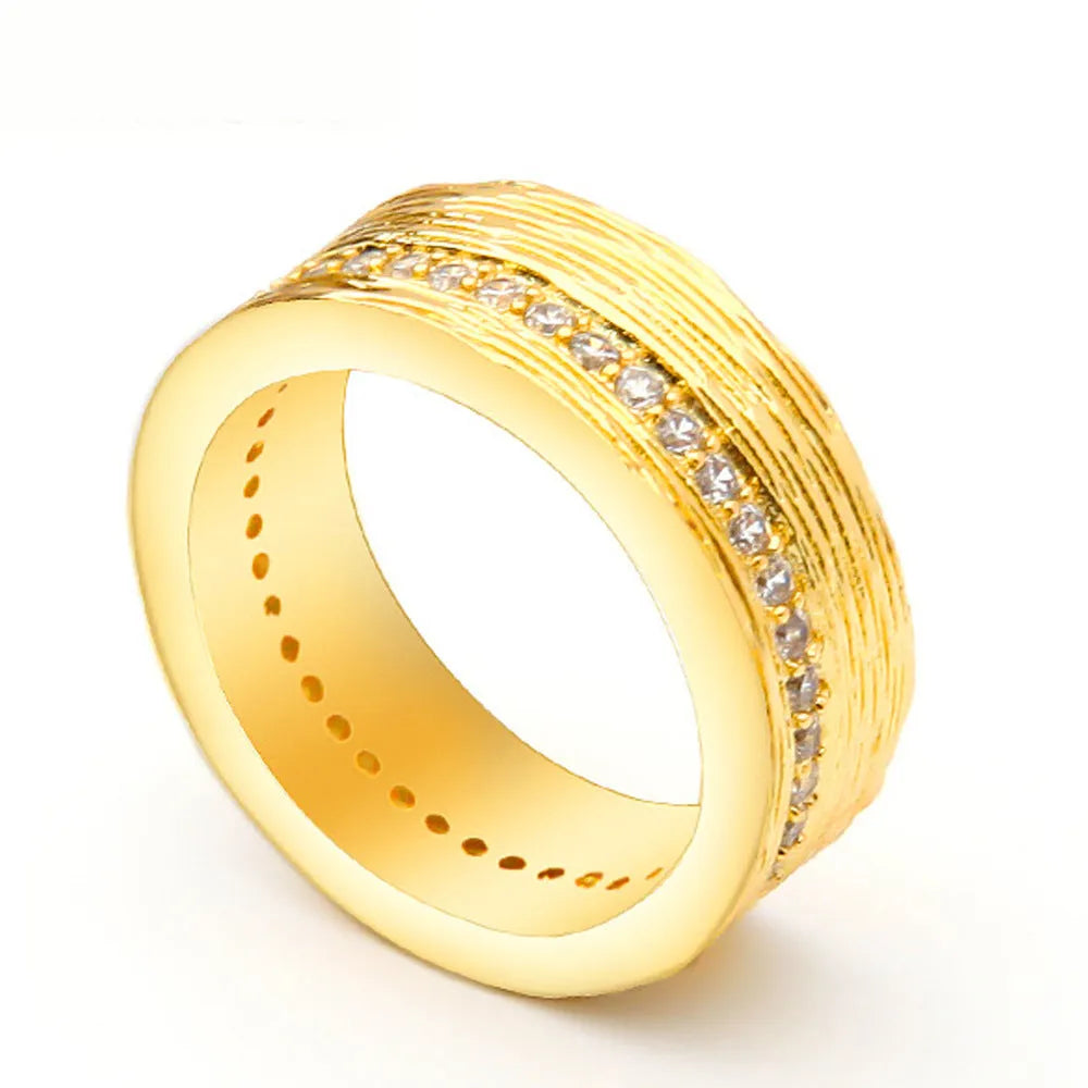 Women's gold geometry ring with angular design and zircon accents on copper base