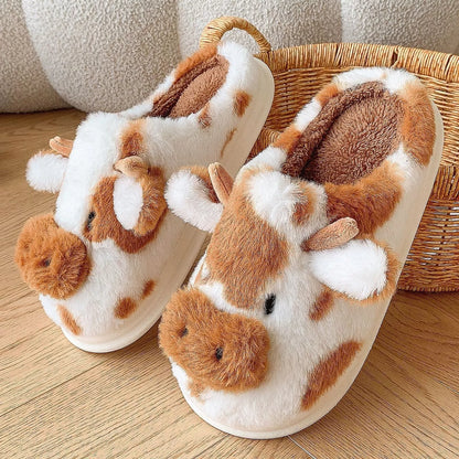 Cartoon cow plush slippers in black, leather red, and brown with non-slip soles