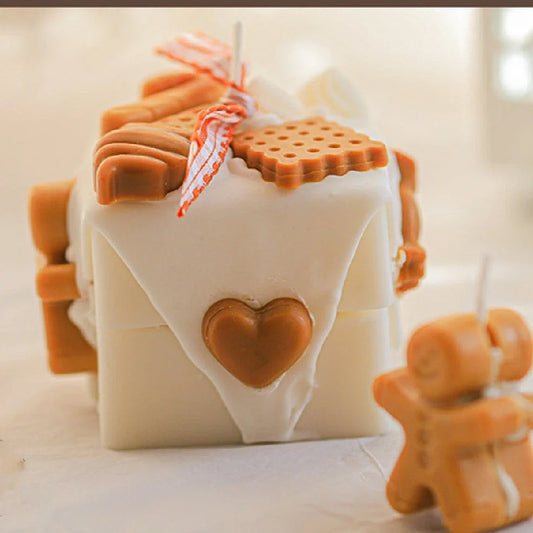 Homemade gingerbread man Christmas scented candles in block shape with six fragrance options