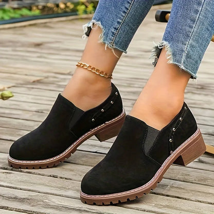 Light brown plus size women's suede ankle boots with a thick low heel and elastic band side closure.