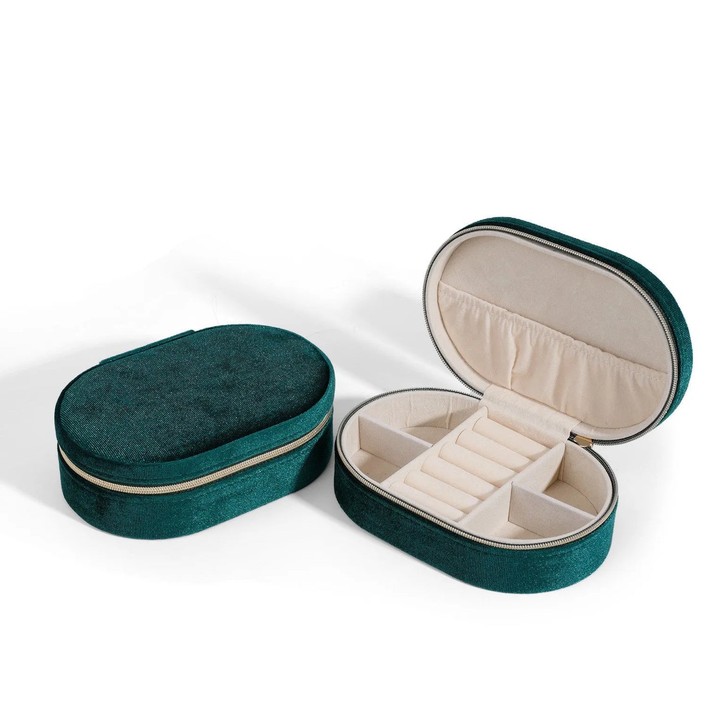 Oval velvet jewellery storage box with flannel lining in lake blue colour showing 15x10x5cm dimensions