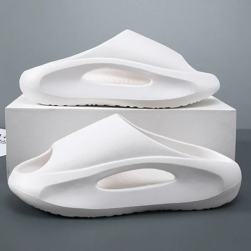 Stylish and comfortable unisex slippers with a unique hollow design, perfect for summer beach and casual wear